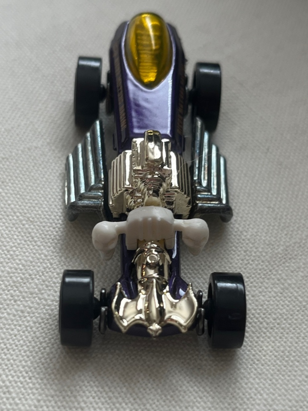 Hot Wheels Vintage Racing Classic
Purple/Yellow Diecast Car 1:64
1994
